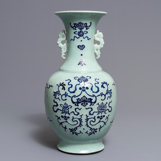 A Chinese blue and white on celadon ground 'buddhist emblems' vase, Qianlong mark and of the period