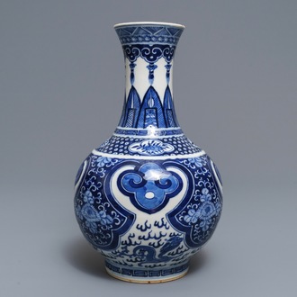 A Chinese blue and white bottle vase, Kangxi mark, 19th C.