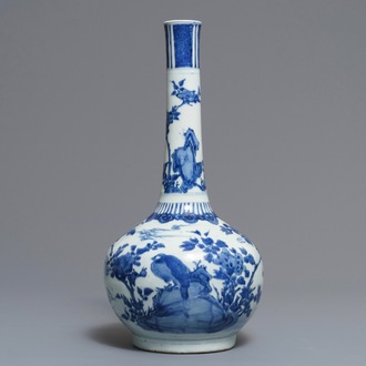 A large Chinese blue and white bottle vase with birds in a landscape, Wanli