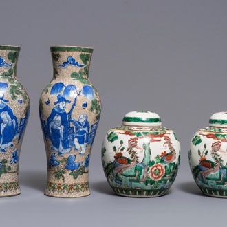 A pair of Chinese famille verte vases and a pair of covered jars, 19th C.