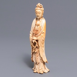 A Chinese carved ivory figure of Guanyin, 18th C.