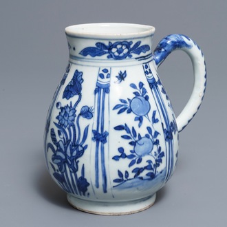 A Chinese blue and white jug with floral design, Wanli