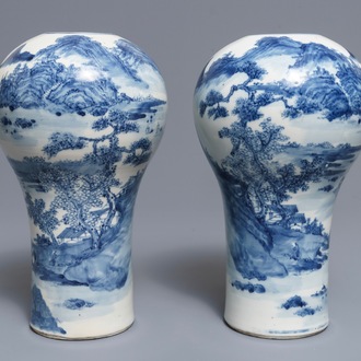 A pair of Chinese blue and white landscape vases, 19/20th C.