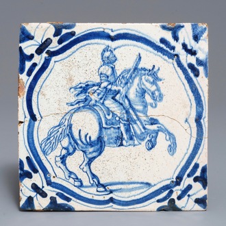 A large Dutch Delft blue and white 'horserider' tile made for the French Chateau de Beauregard, ca. 1627