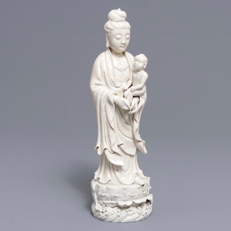 A Chinese blanc de Chine model of Guanyin and child, 19th C.