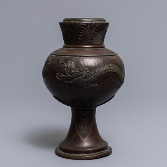 A Chinese bronze relief-decorated dragon vase, 17/18th C.