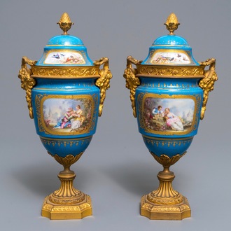 A pair of Sèvres-style 'bleu céleste' ormolu-mounted vases and covers, France, 19th C.