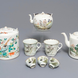 Three Chinese famille rose and qianjiang cai teapots and five cups, 19/20th C.