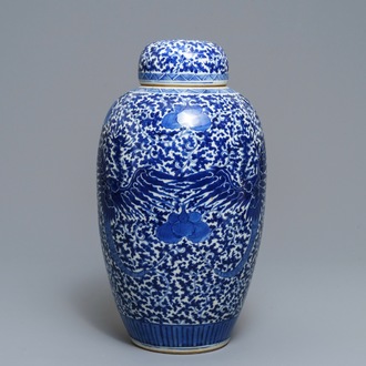 A Chinese blue and white 'phoenix' jar and cover, 19th C.