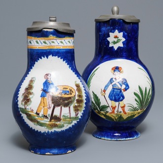 Two Brussels faience pewter-mounted blue-ground jugs, 19th C.