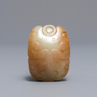 Un pendentif en jade rouille à inscription 'Charme du tigre', 19/20ème