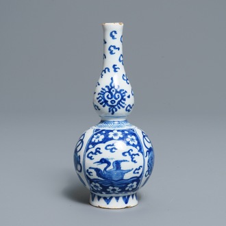 A Dutch Delft blue and white double gourd vase with swans and chinoiserie, late 17th C.