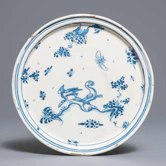 An Alcora faience blue and white tazza with birds and insects, Spain, 18th C.