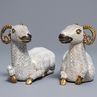 A pair of Chinese cloisonné and gilt bronze models of rams, Qianlong