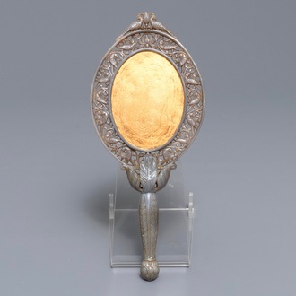 A Chinese Mughal-style carved grey jade hand mirror, 19/20th C.