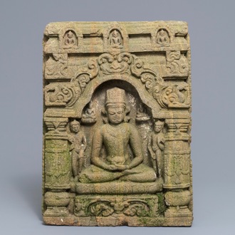 A sandstone relief depicting the seated Buddha in a temple, India, 12/13th C.