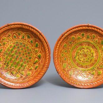 Two slip-decorated earthenware dishes, Northern Netherlands, 1st half 17th C.