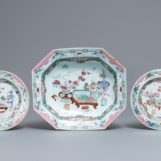 A Chinese famille rose basin and a pair of plates with 'antiquities' design, Qianlong