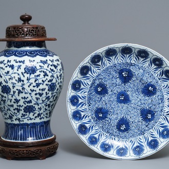 A Chinese blue and white 'aster' dish and a 'peony scroll' vase, Kangxi and 19th C.