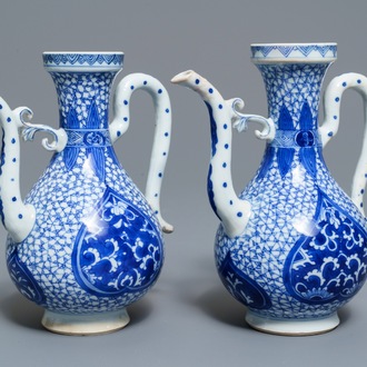 A pair of Chinese blue and white Islamic market jugs, Kangxi
