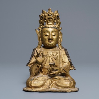 Een Chinese verguld bronzen figuur van Boeddha, Ming