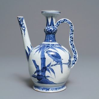 An unusual Japanese Arita blue and white jug with birds among foliage, Edo, 17th C.