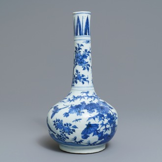 A Chinese blue and white bottle vase with birds in a landscape, Wanli