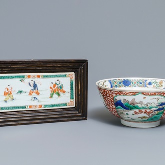 A Chinese famille verte plaque with playing boys and a landscape bowl, Kangxi
