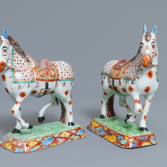 A fine pair of polychrome petit feu and gilded Dutch Delft models of horses, 1st half 18th C.