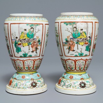 A pair of Chinese famille verte urns, 19th C.