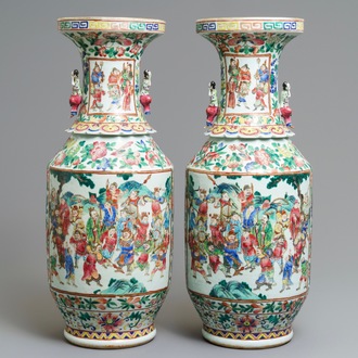 A pair of Chinese famille rose lady-handle vases, 19th C.