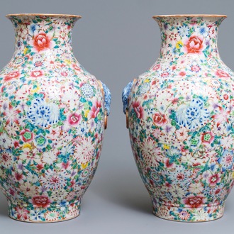 A pair of Chinese famille rose 'millefleurs' vases, Qianlong mark, Republic, 20th C.