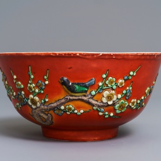 A Chinese coral-red relief-decorated bowl, 19th C.