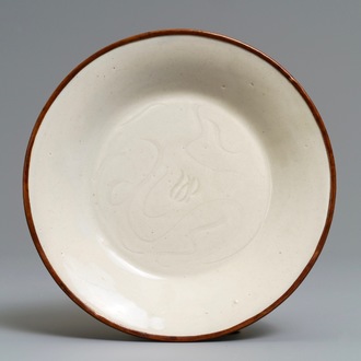 A Chinese dingyao carved 'ducks' plate, probably Song