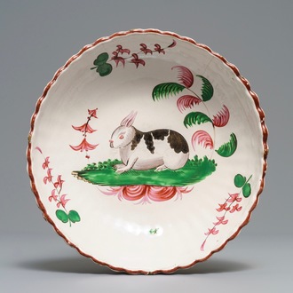 A large Strasbourg faience gadrooned 'rabbit' bowl, France, 18th C.