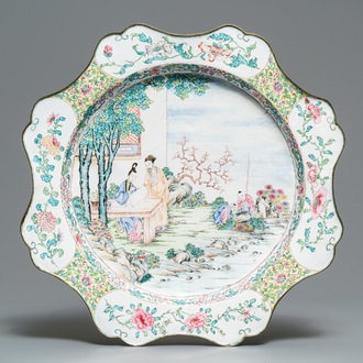 A large Chinese Canton enamel charger with figures in a garden, Yongzheng