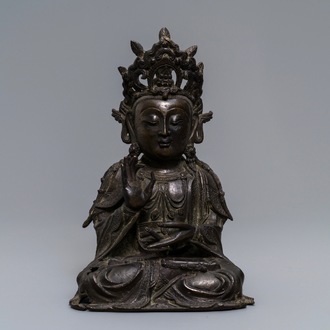 A Chinese bronze model of Guanyin, Ming