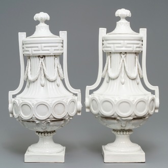 A pair of tall neoclassical Sevres-style covered vases, France or Germany, 18/19th C.