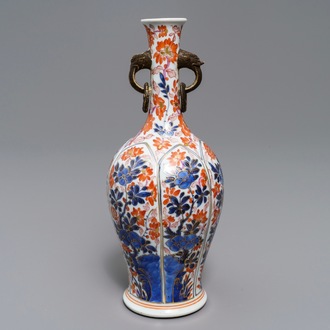 A Chinese floral Imari-style ring-handled vase, Kangxi