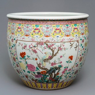 A large Chinese famille rose fish bowl with birds among flowers, 19th C.