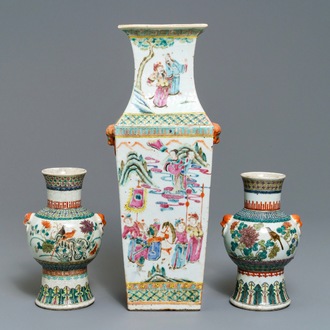 A Chinese famille rose square vase and a pair of famille verte hu vases, 19th C.