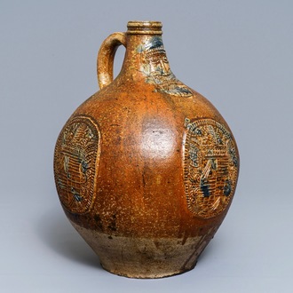 A large German stoneware Bellarmine jug with blue marriage seals, Frechen, 1st half 17th C.