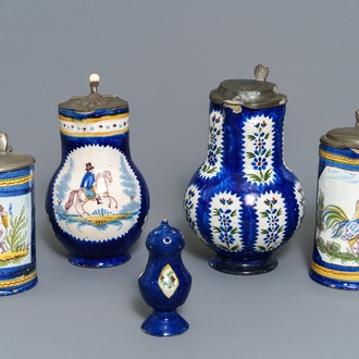 Four pewter-mounted Brussels faience jugs and a shaker, 18/19th C.