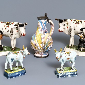 Two pairs of Dutch Delft cows and a pewter-mounted Habaner jug, 18th C.