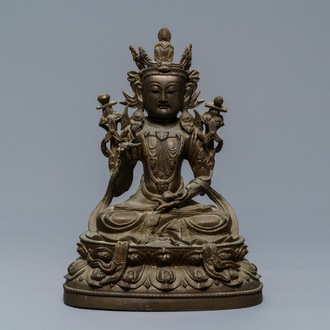 A Chinese bronze figure of Guanyin, Ming