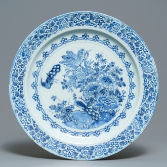 An exceptionally fine large Dutch Delft blue and white 'peacock and flowers' dish, 17th C.