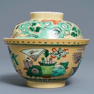 A Chinese famille verte café-au-lait-ground bowl and cover, Kangxi