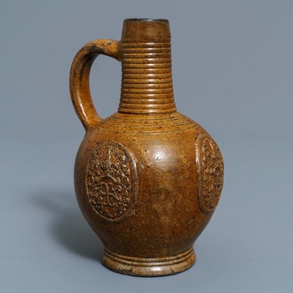 A Belgian stoneware armorial jug with CR monogram, Bouffioulx, 16/17th C.