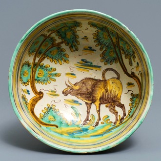 A large polychrome Spanish bowl with a bull, Talavera, 18th C.
