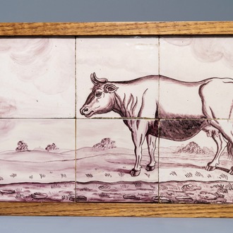 A Dutch Delft manganese tile mural with a cow, 18th C.